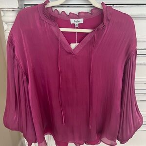 Brand new, never worn FATE metallic blouse,size Medium